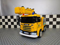 Camion gru elettrico Scania 12V giallo