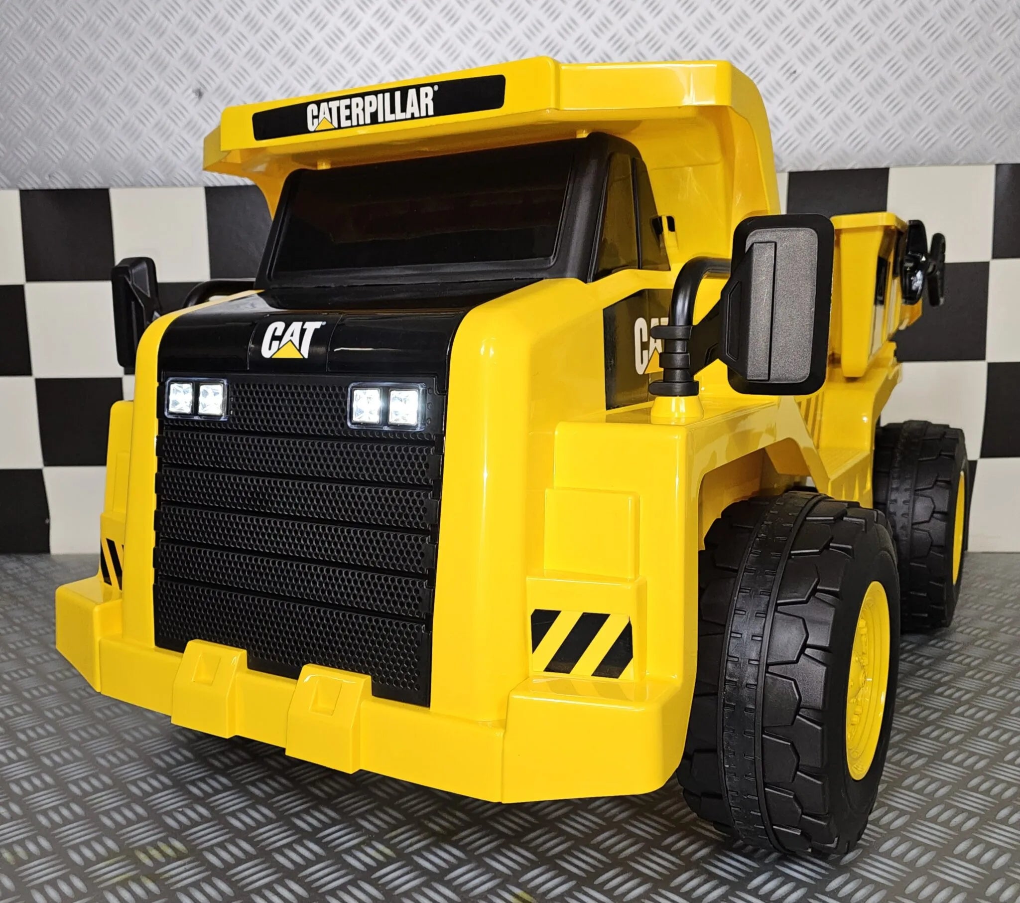 Camion ribaltabile elettrico per bambini Caterpillar 12V