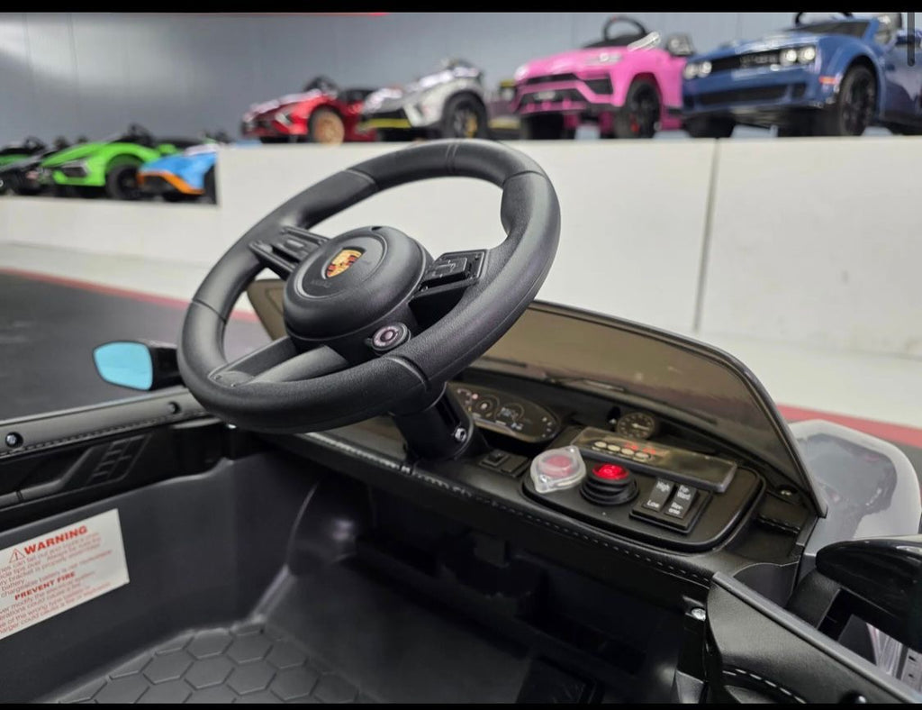Auto elettrica per bambini Porsche Taycan 1 posto 12V grigia