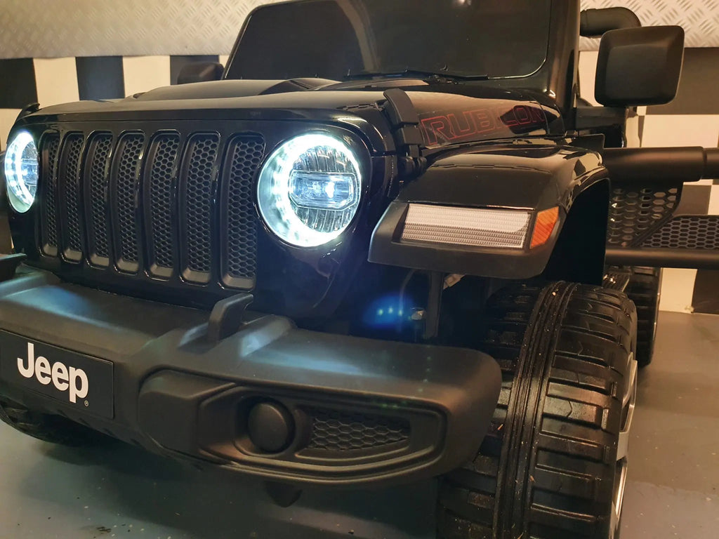 Auto elettrica per bambini Jeep Wrangler 12V 4WD nera metallizzata