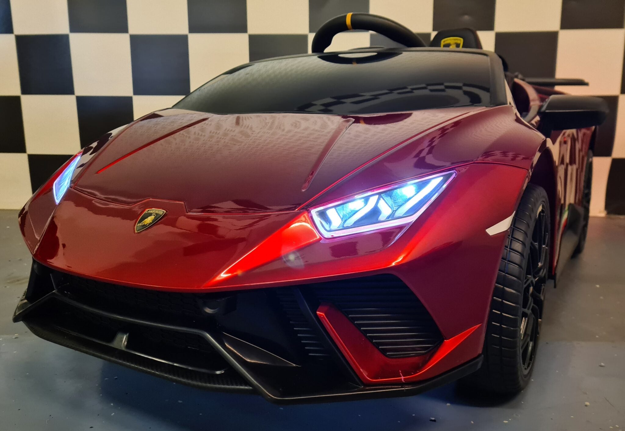 Auto elettrica per bambini Lamborghini Huracan 12V rosso metallizzato