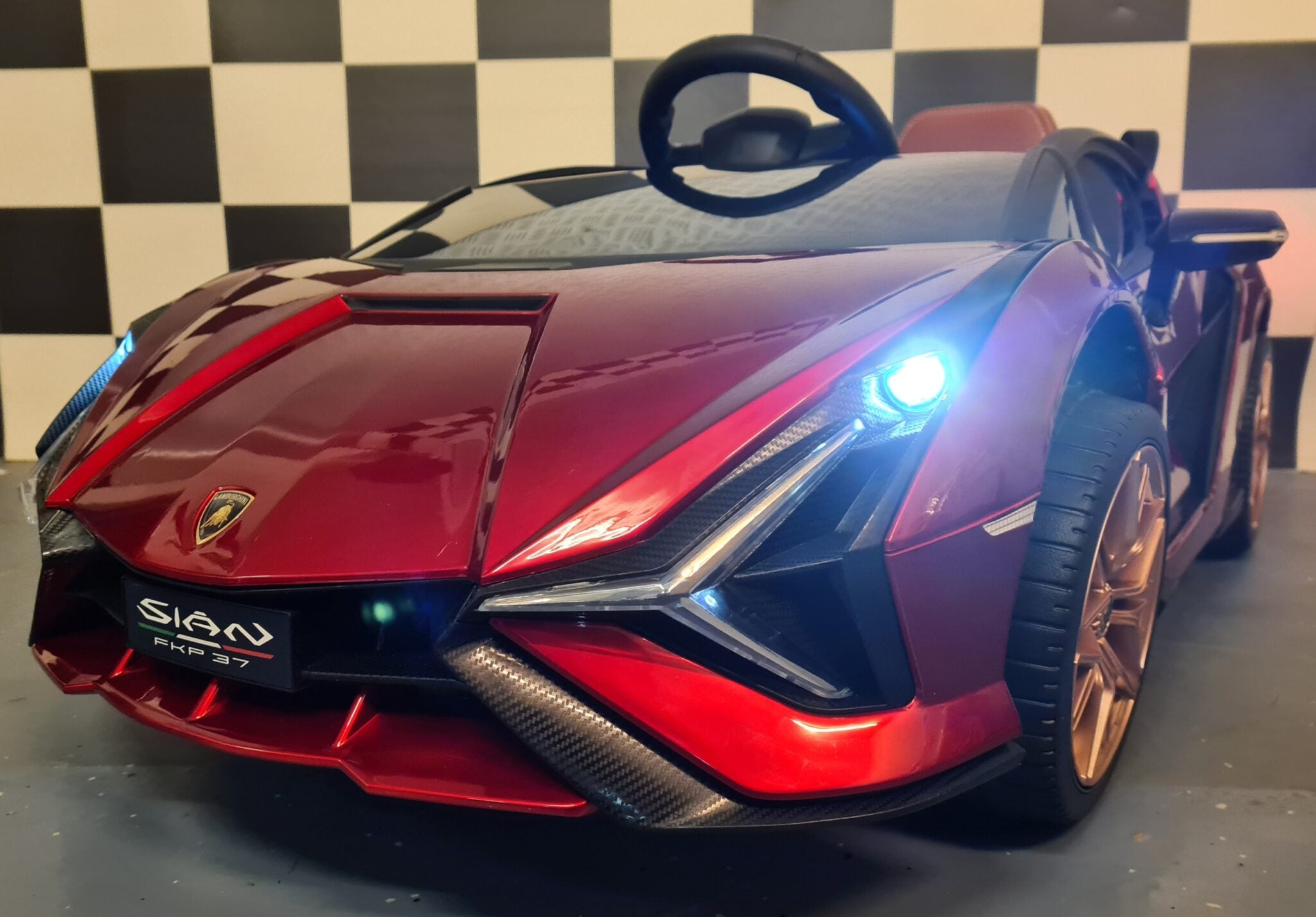 Auto elettrica per bambini Lamborghini Sian 12V rosso metallizzato