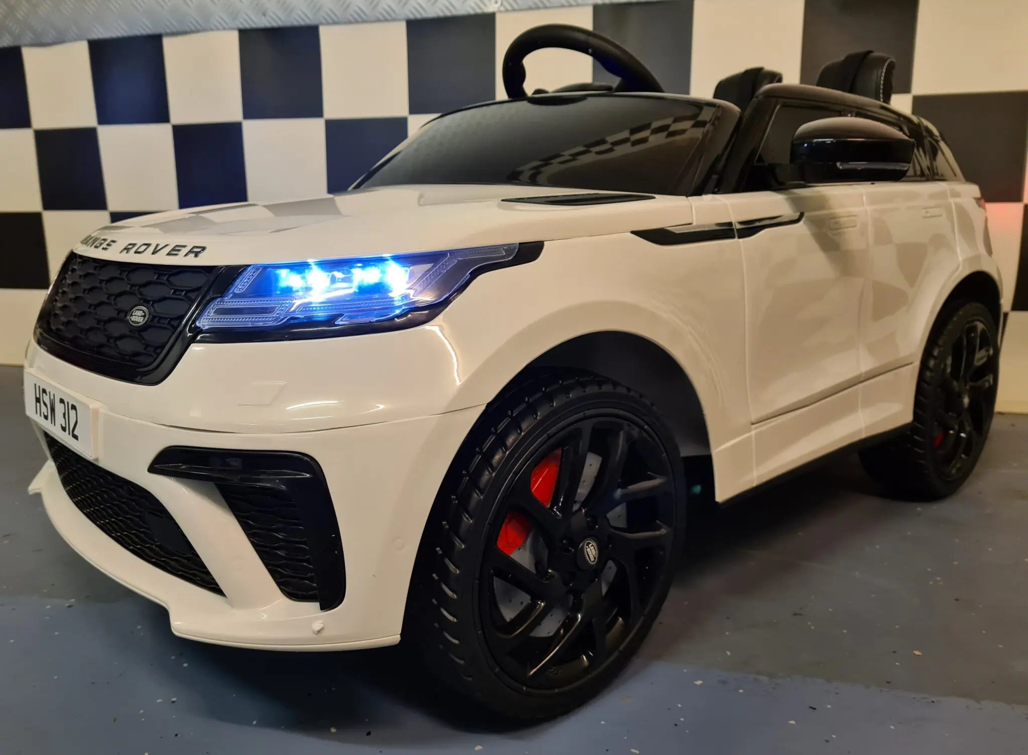 Auto elettrica per bambini Range Rover Velar 12V bianca