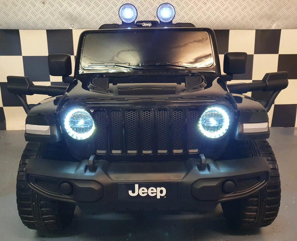 Auto elettrica per bambini Jeep Wrangler 12V 4WD nera metallizzata