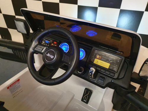Auto elettrica per bambini Jeep Wrangler 12V 4WD bianca