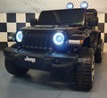 Auto elettrica per bambini Jeep Wrangler 12V 4WD nera metallizzata