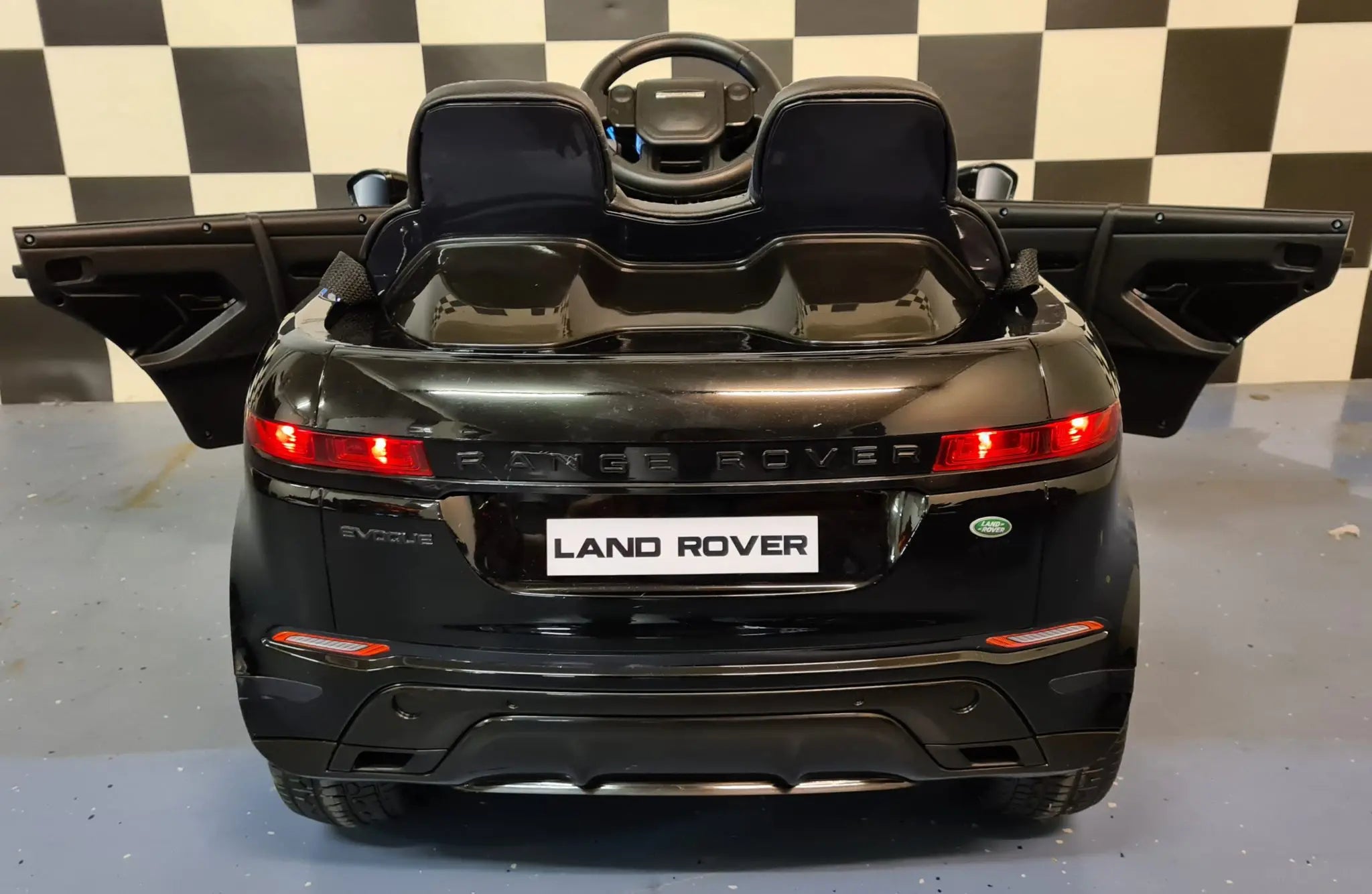 Auto elettrica per bambini Range Rover Evoque 4x4 nero metallizzato