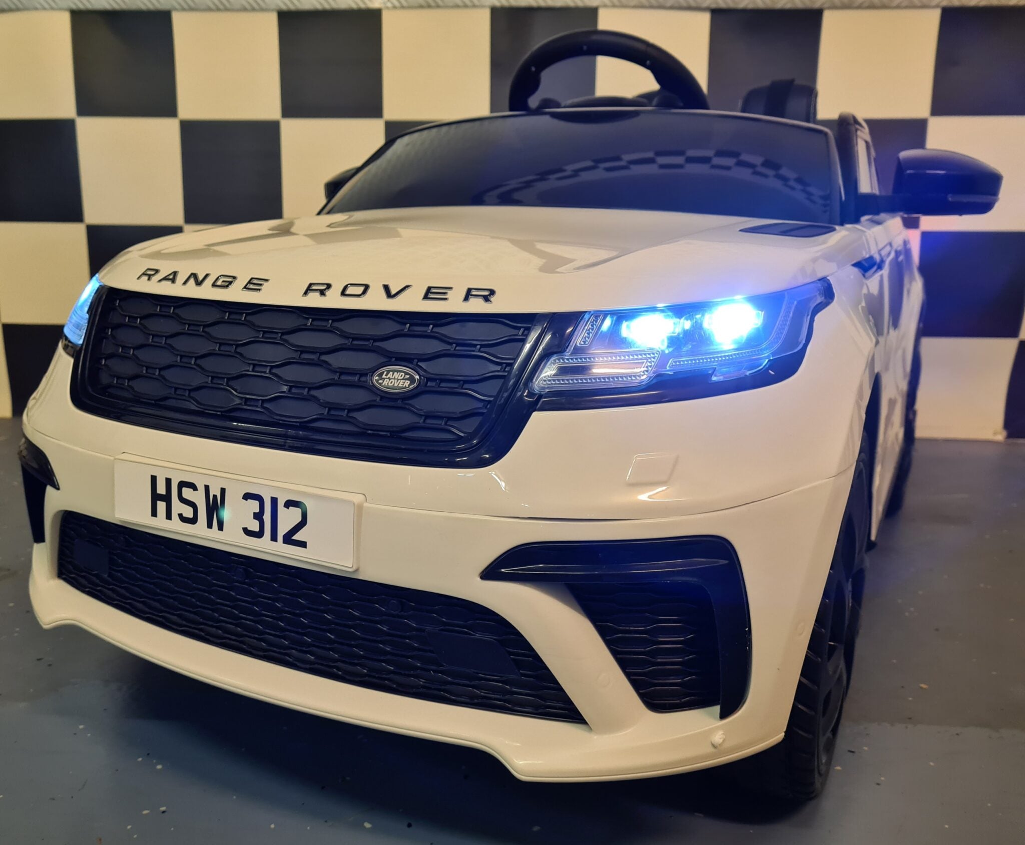 Auto elettrica per bambini Range Rover Velar 12V bianca