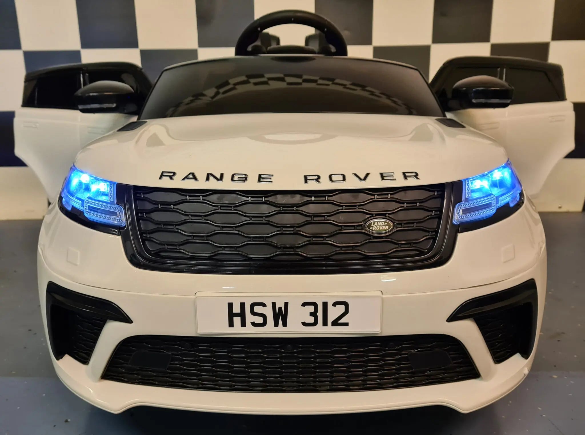 Auto elettrica per bambini Range Rover Velar 12V bianca
