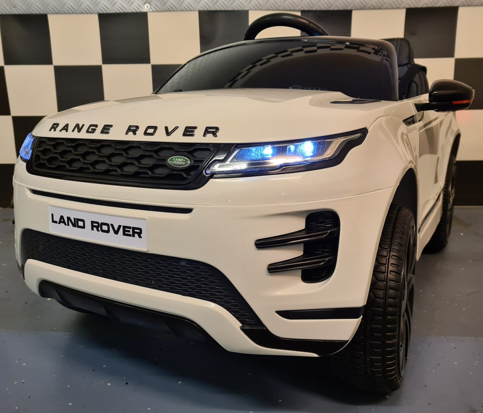 Auto elettrica per bambini Range Rover Evoque 4x4 12V bianca