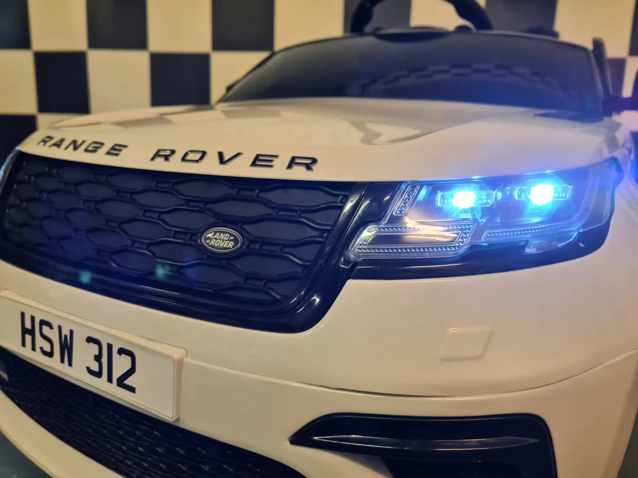 Auto elettrica per bambini Range Rover Velar 12V bianca