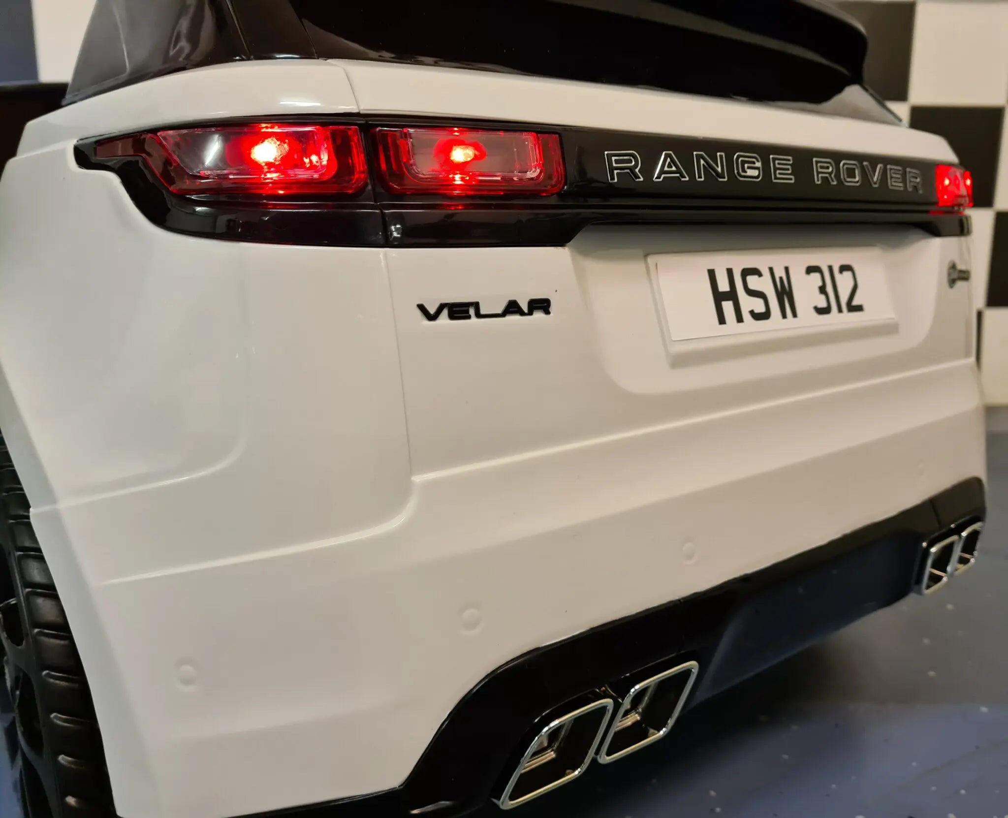 Auto elettrica per bambini Range Rover Velar 12V bianca