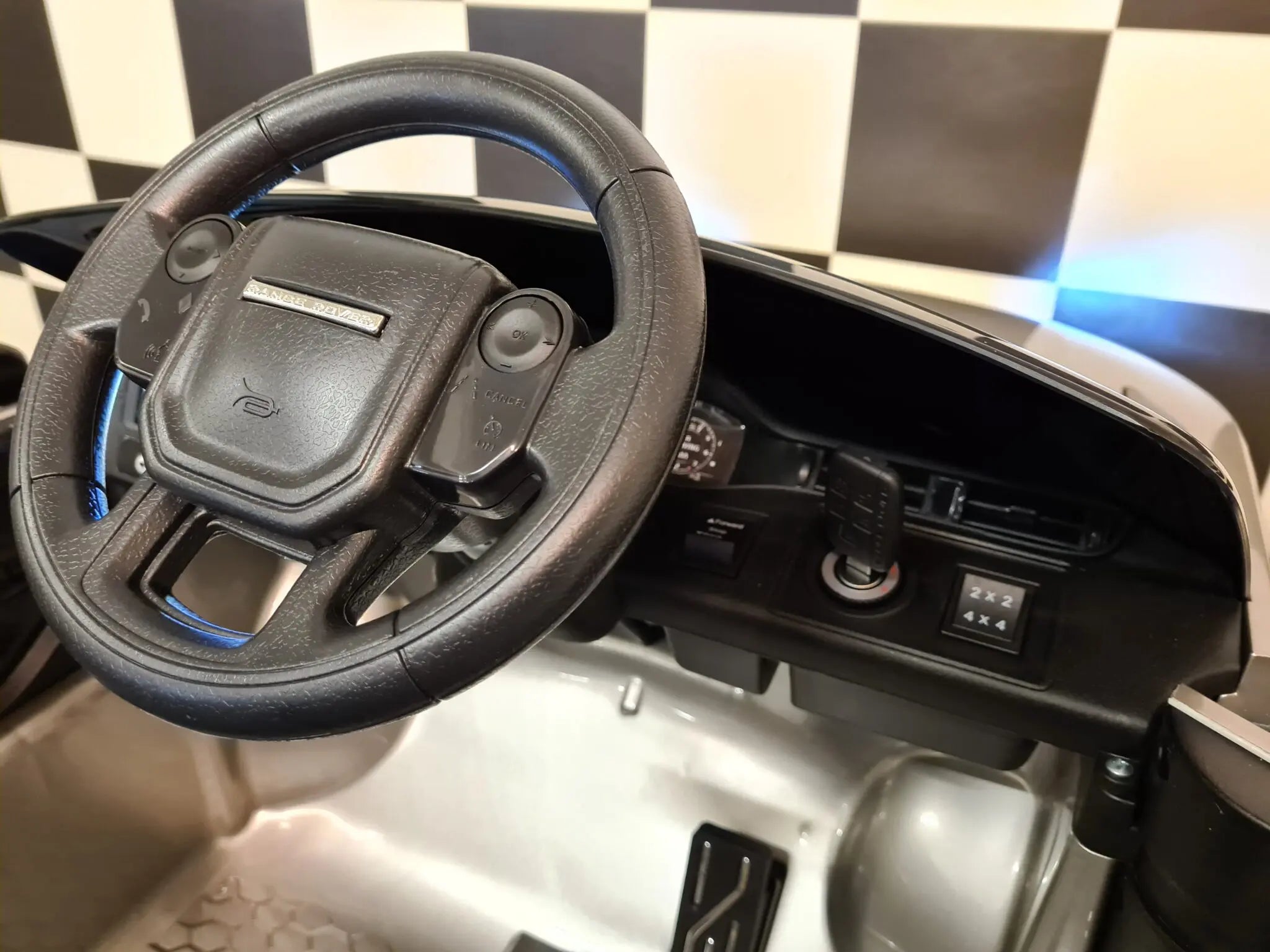Auto elettrica per bambini Range Rover Evoque 4x4 grigio metallizzato