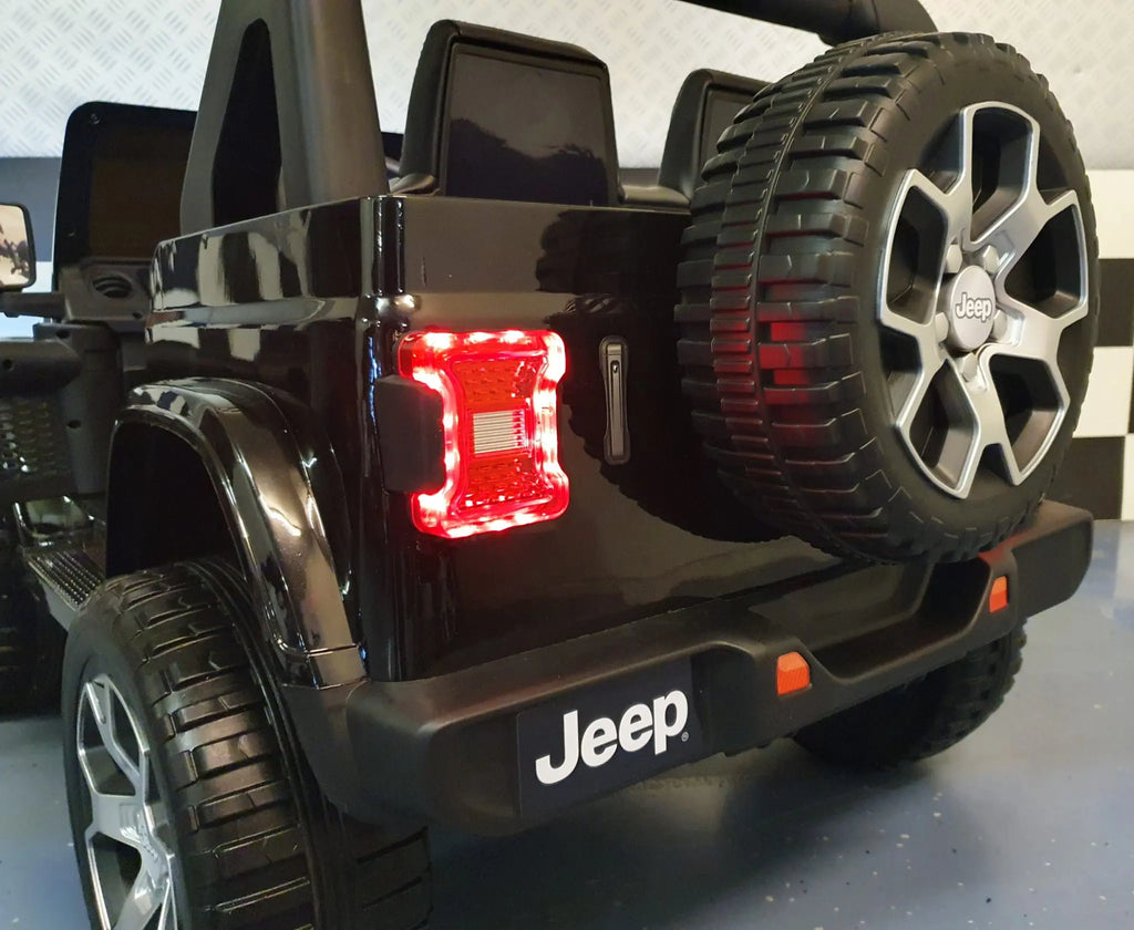 Auto elettrica per bambini Jeep Wrangler 12V 4WD nera metallizzata